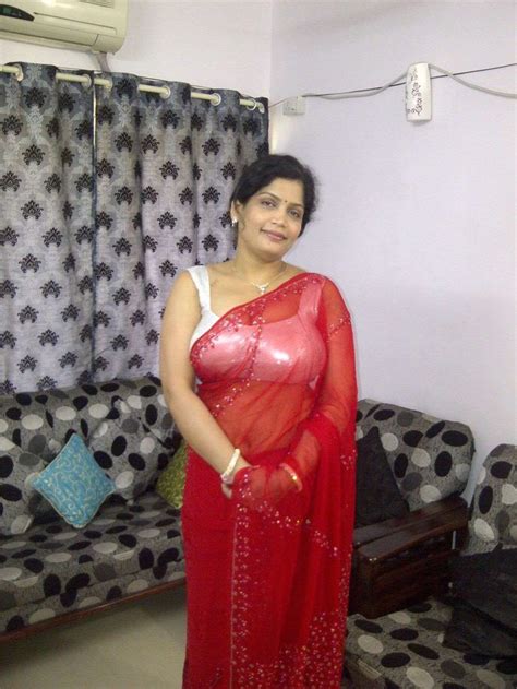 desi blouse nude|Desi aunty big boobs showing with an open blouse